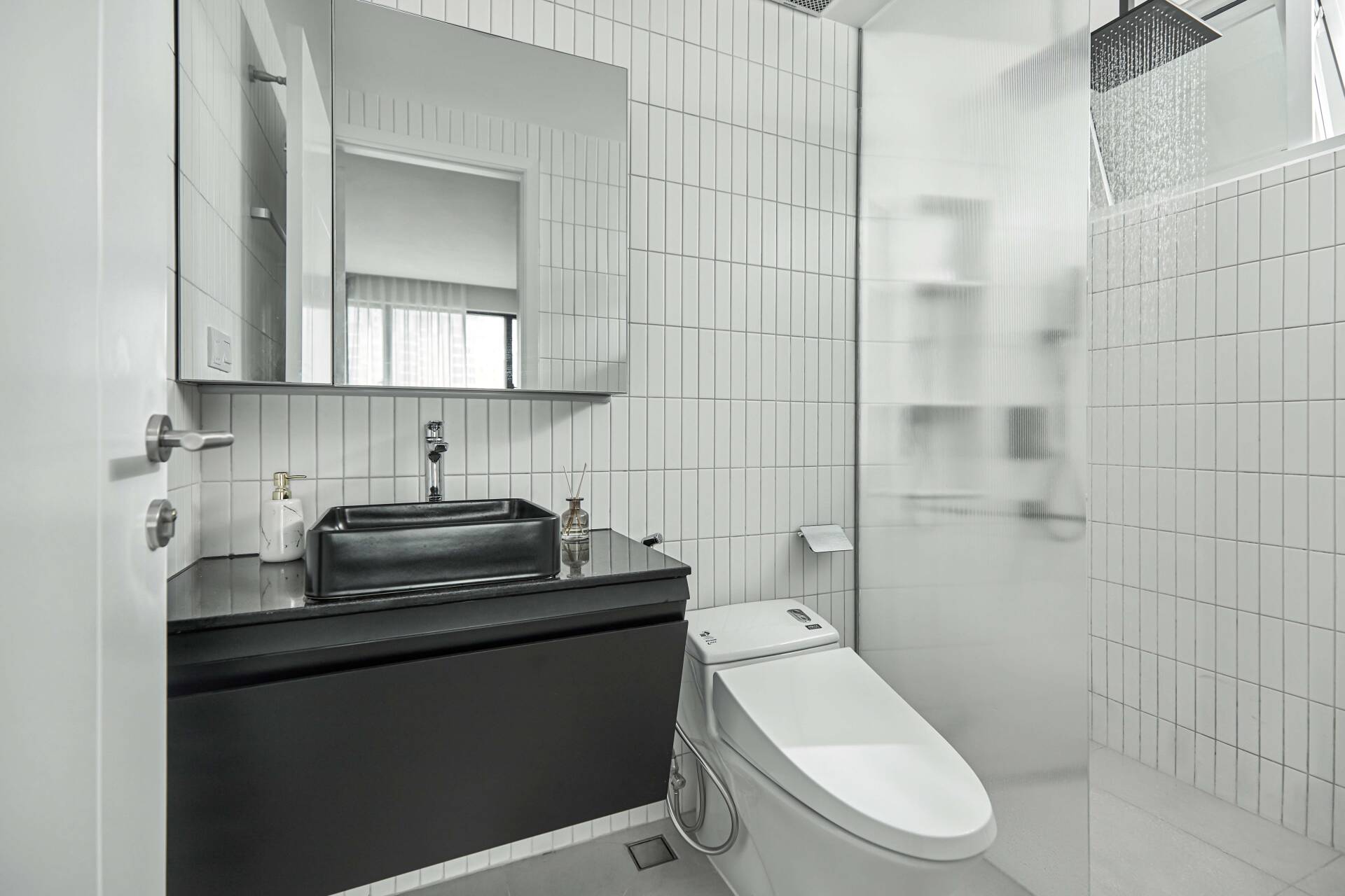 The bathroom is divided into two separate areas, dry and wet ones, which make it look very scientific and modern