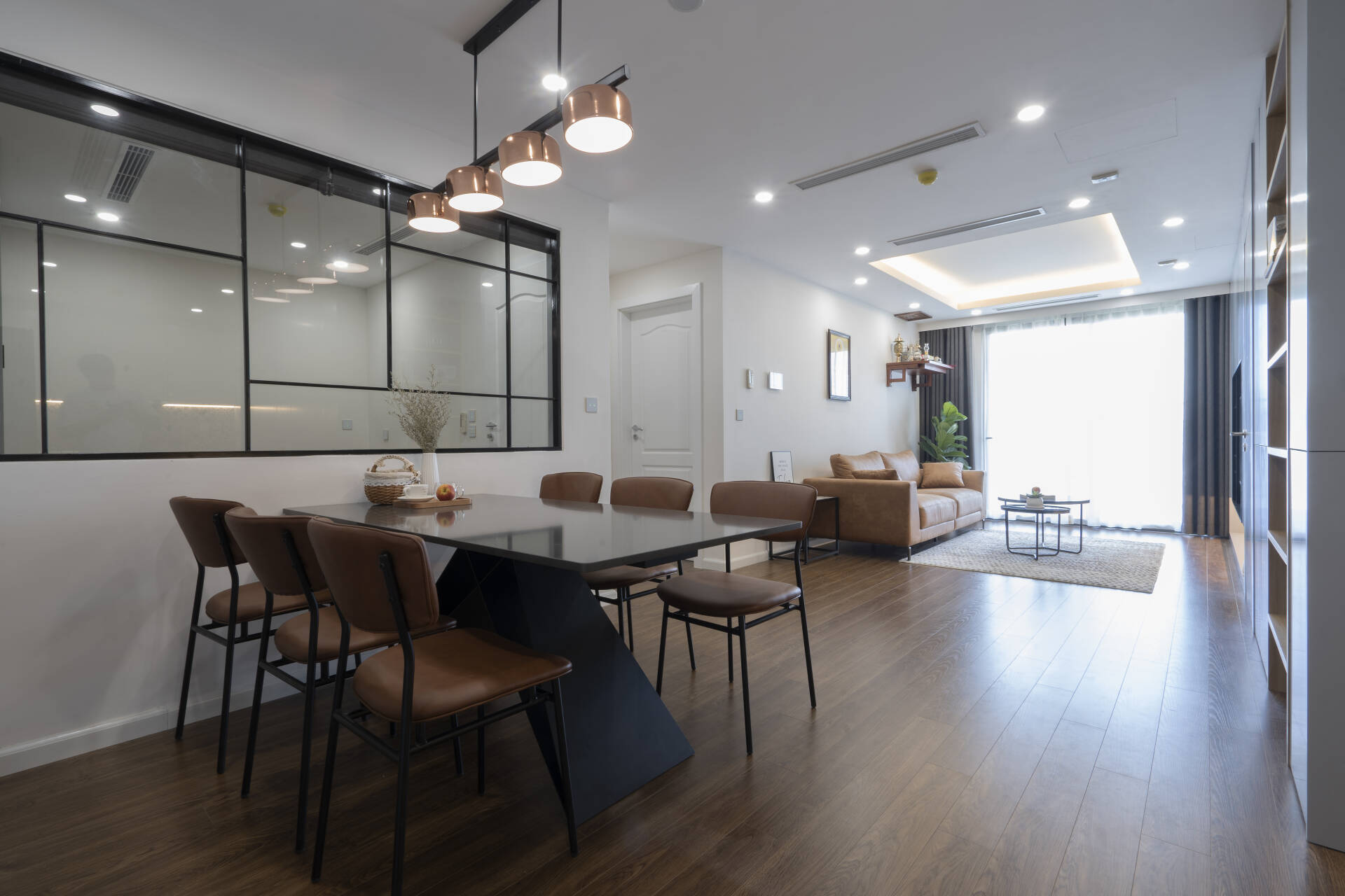Open space is full of light thanks to a large glass door in the living room. Open space is full of light thanks to a large glass door in the living room.