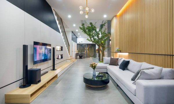 Common living area on the first floor includes the living room, kitchen – dining area and a garage.