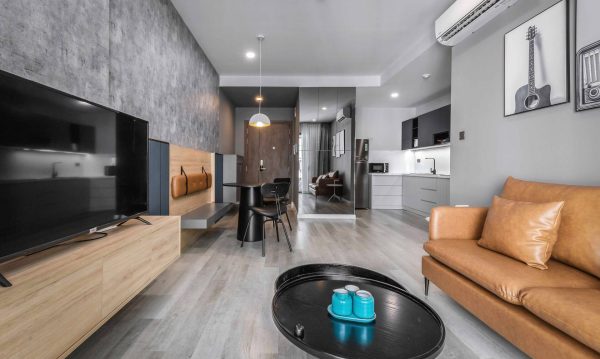 The floor is lined with faux wood plastic harmoniously with the overall design of the house