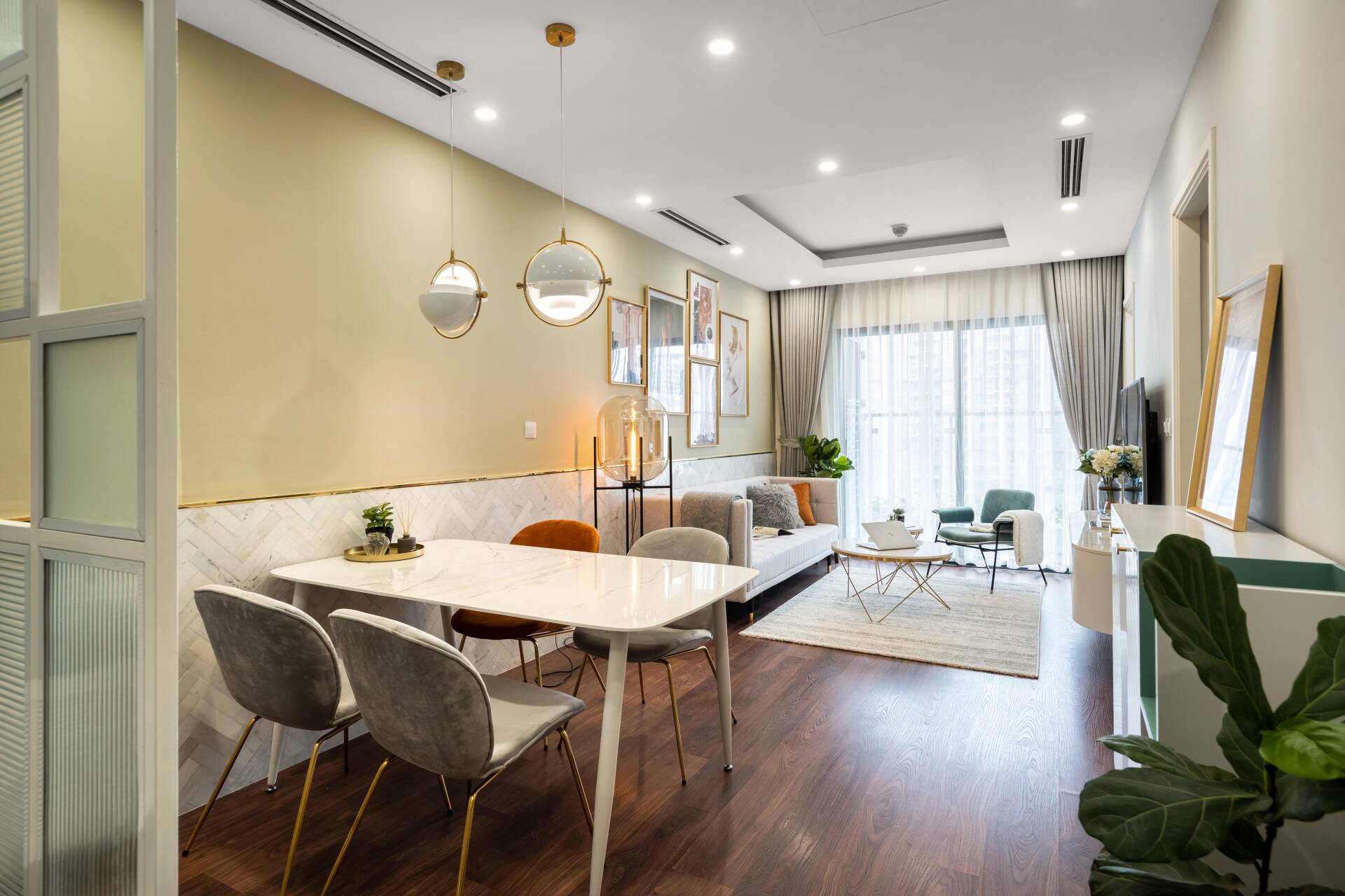 The dining area and living room are connected, creating a more spacious feeling.