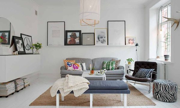 The living room is filled with beautifully decorated natural light.