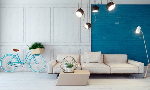 The blue color becomes poetic when placed next to the white wall adorned with a lovely bicycle.