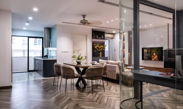 The entire living room space in particular and the entire apartment space in general are filled with light.