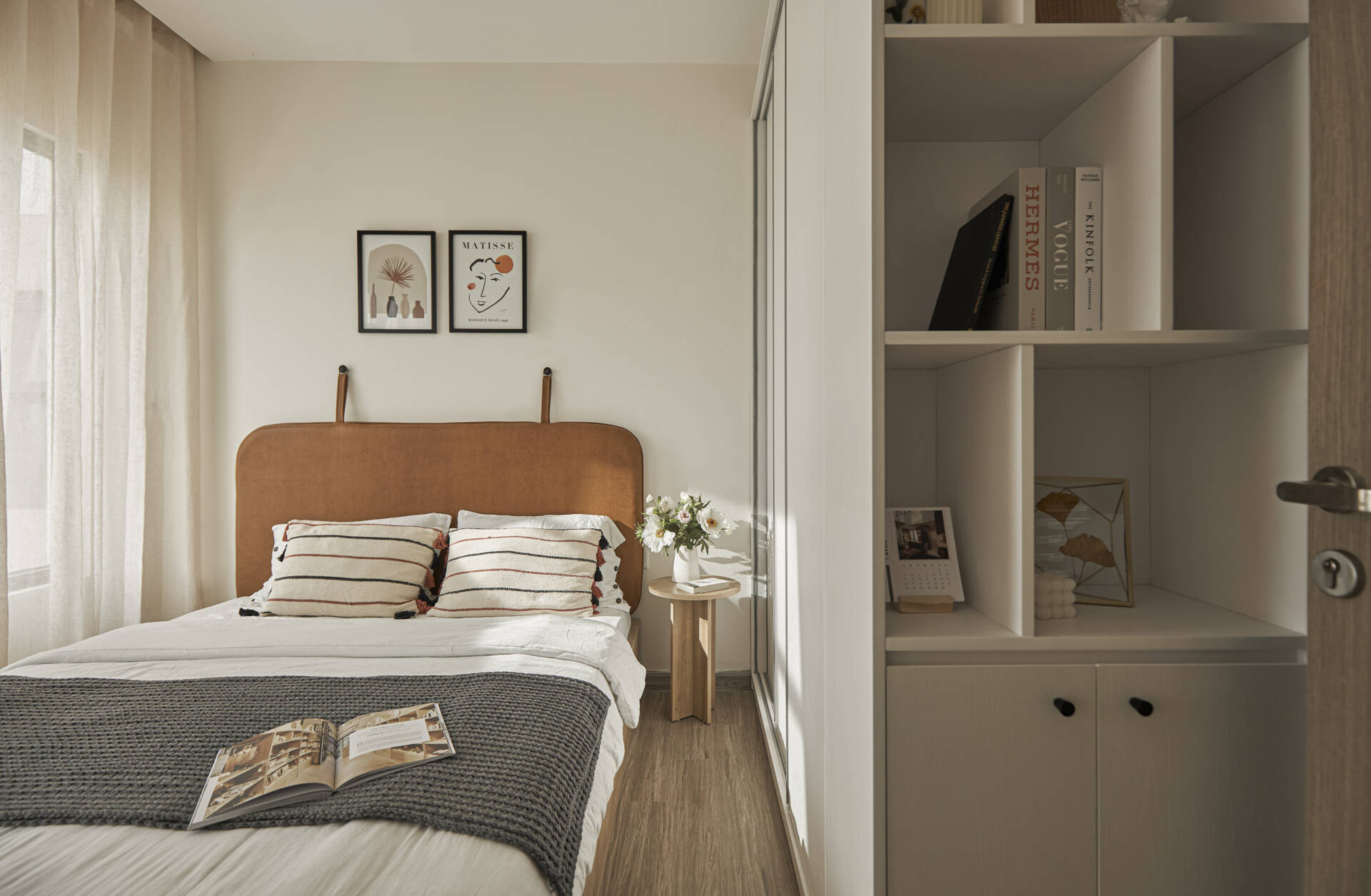 The owner's beautiful small bedroom, ceiling wardrobe combined with convenient shelves, optimizes the living and storage area.