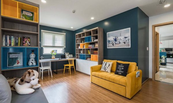 Colorful bookshelves appear more in the working room.