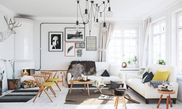 The living room looks impressive thanks to sunlight shining through the windows creating parallel lines of light.