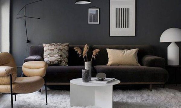The lampshade helps to direct light in a certain space.