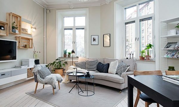 White wood floor creates an airy and cool feeling for the room.