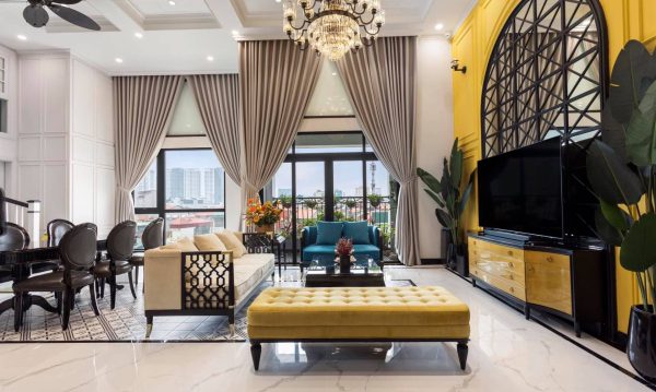 The living room is always full of natural light thanks to a large glass door system.