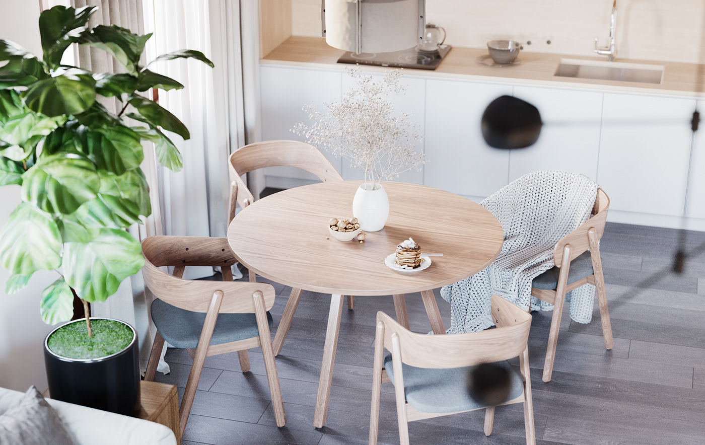 A small set of dining chairs and table made of wood help to increase the free space.