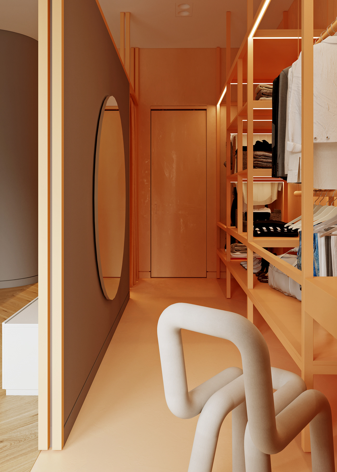 Inside the room, a large wardrobe is also equipped with a big round mirror for the preparation process.