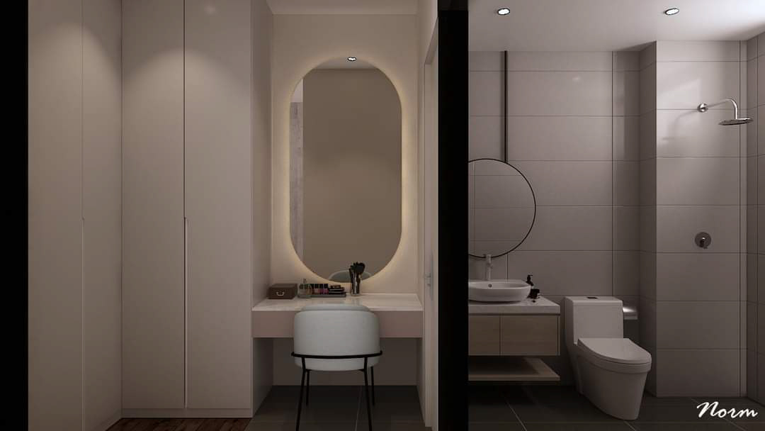 With modern and square lines and white as the main color, the bathroom is also integrated into this bedroom next to the preparation zone. A round mirror above the sink balances out the overall contours of this space.