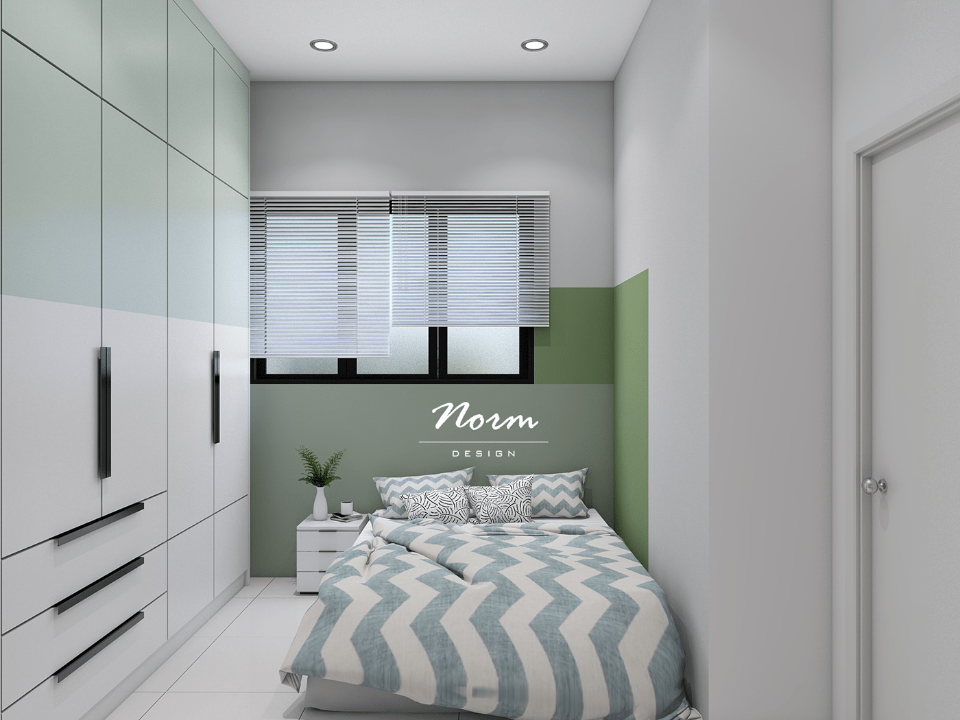 With the main white and green tones, a bedroom with a streamlined layout and a window allowing natural light in helps to make the interior space more sophisticated and modern. A blue zigzag pattern on the bed sheet and pillows help to break up the monotony in this room.