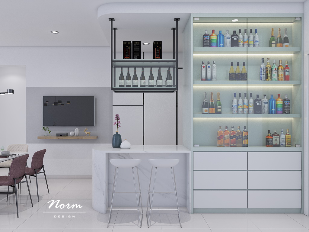 A small bar with glass wine cabinets in this area is a great place to enjoy wine and talk. On the white background of the overall space, colorful wine bottles visible through a large glass door are the focal point.