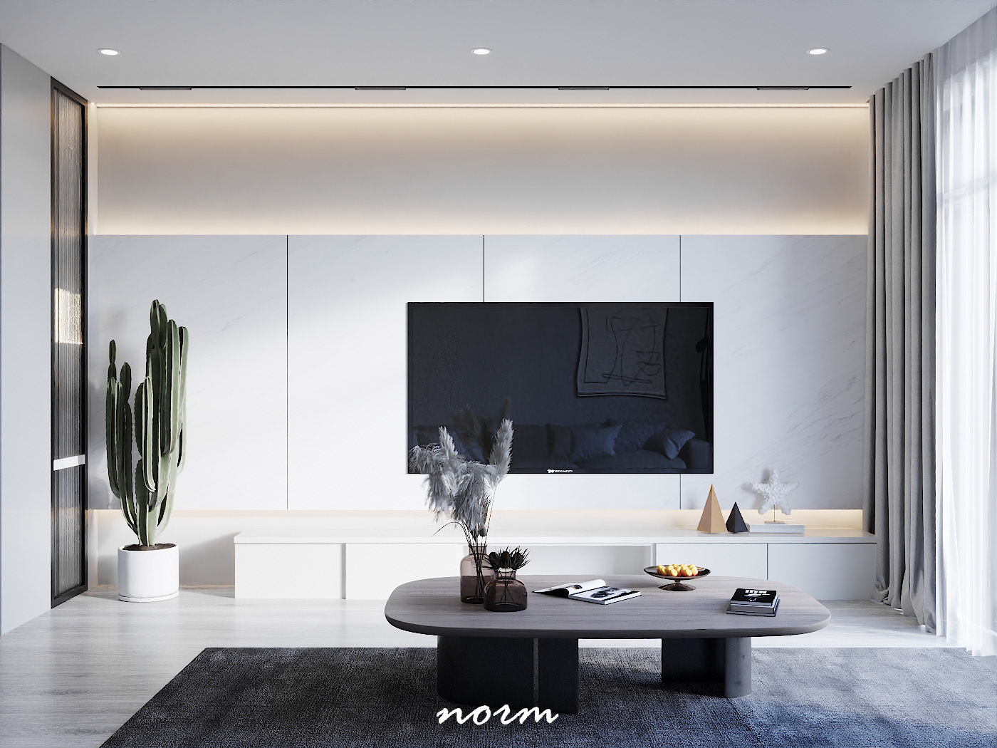 This living room is modern, with straight lines in neutral tones and relatively simple furniture such as a TV, a dark gray coffee table, and a center rug.